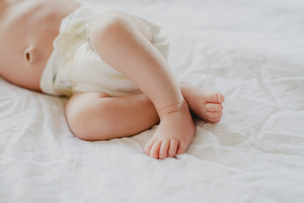 Details of a sleeping newborn baby's feet